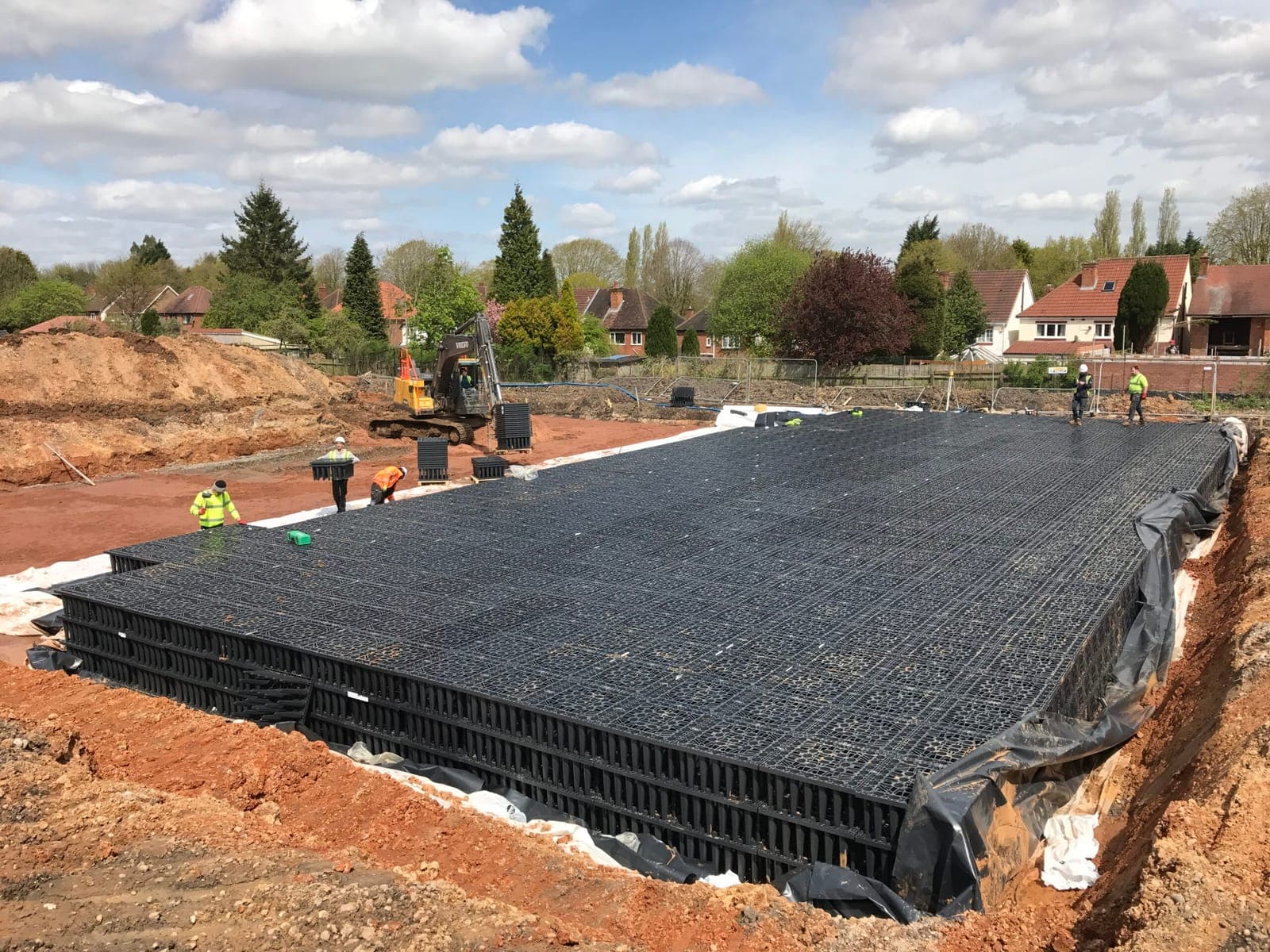 Geocellular crates built out across the lined base of the 500m³ attenuation tank in Bournville, Birmingham